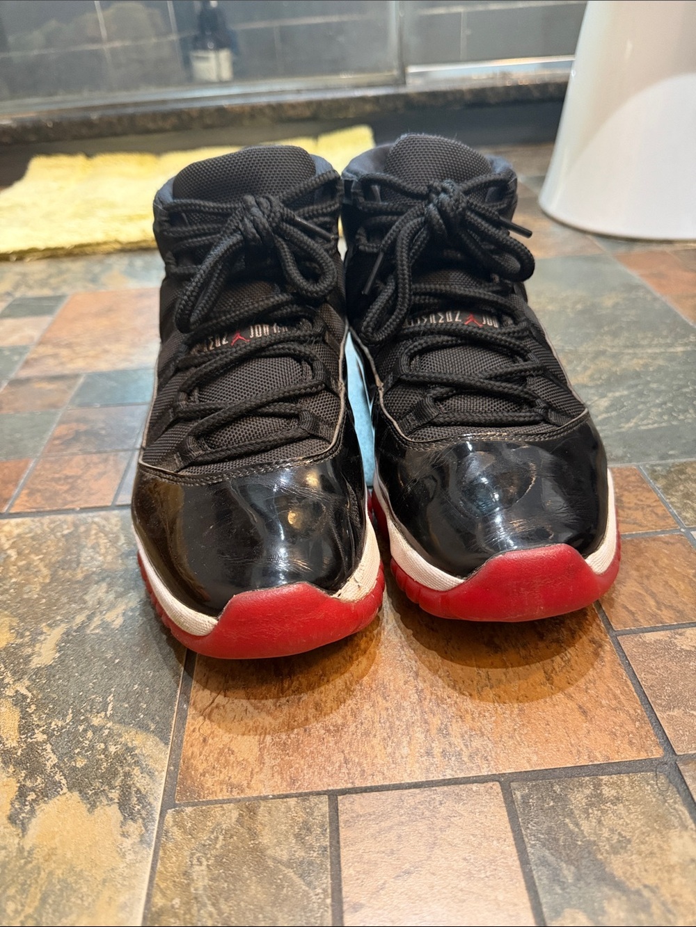 Jordan 11 Black and Red Basketball Sneakers